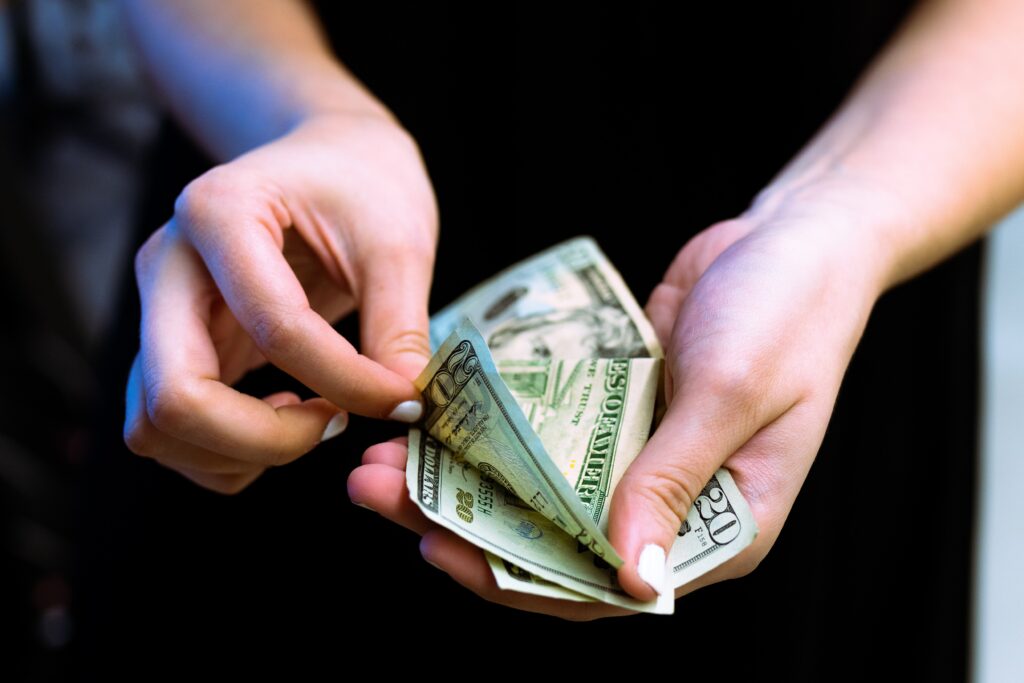 Woman counting out cash