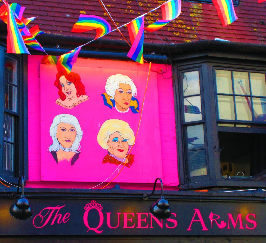 The Queen Arms pub sign with Golden Girls mural