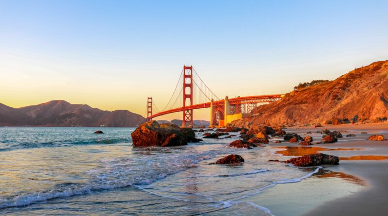 Sandy beach with Golden Gate Bridge in the background