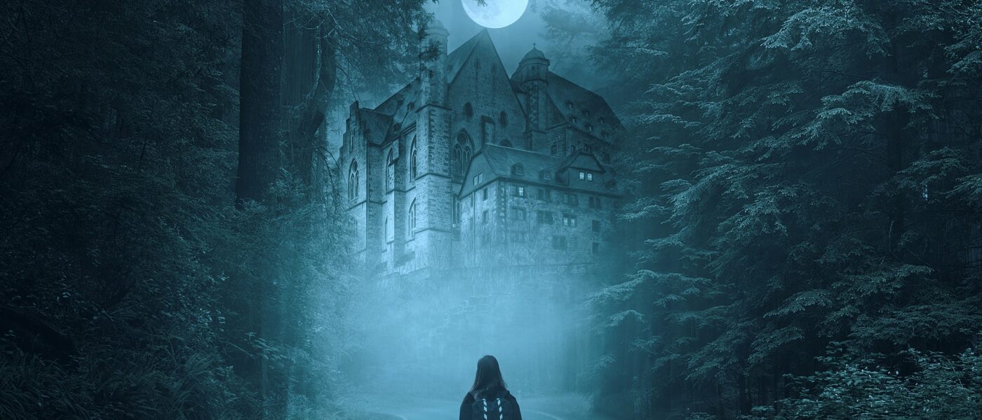 Woman with backpack standing in front of a haunted house during a full moon night