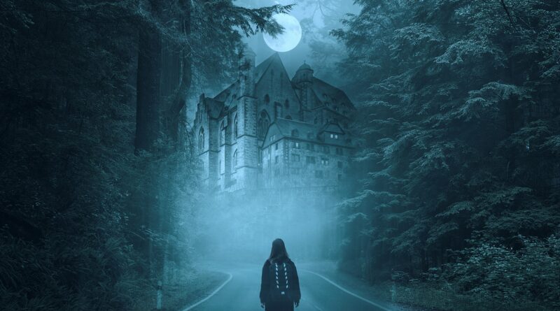 Woman with backpack standing in front of a haunted house during a full moon night