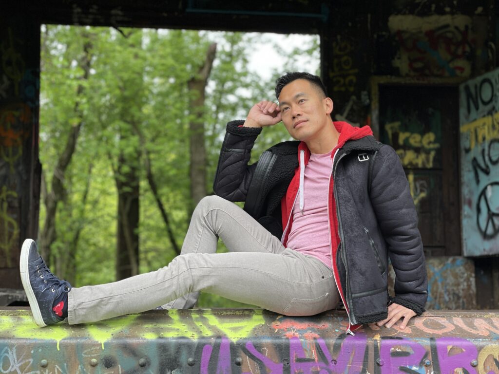 Barry Hoy poses for a photo near abandoned train cars by Lambertville, New Jersey (Photo Credit: Barry Hoy)