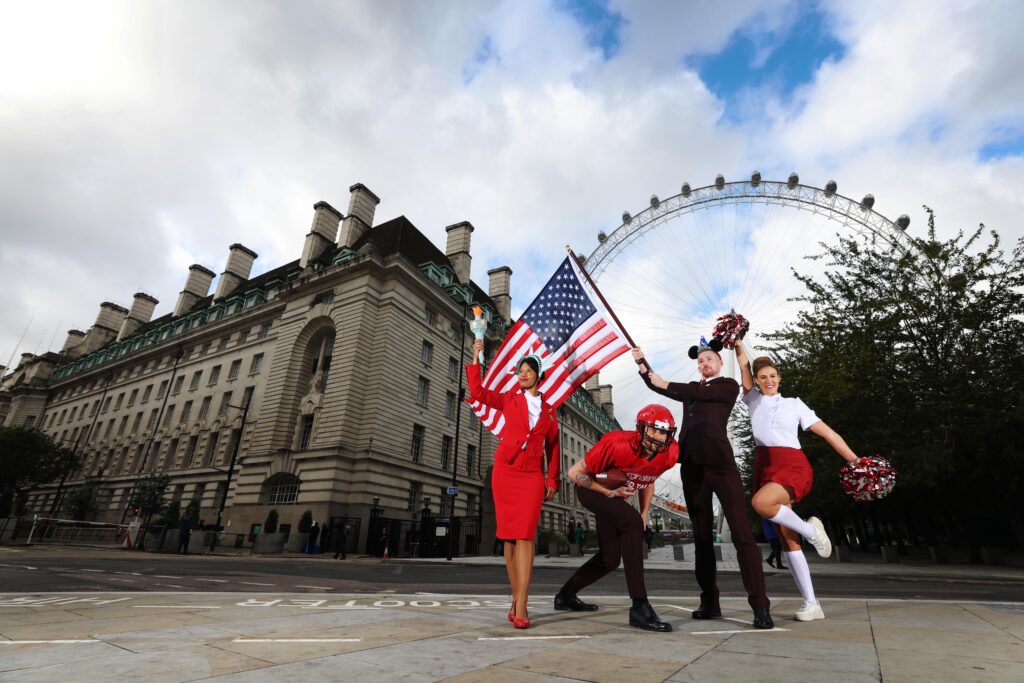 Virgin Atlantic cabin crew pose at the London Eye to bring to life new research on what Brits are most looking forward to about returning to the United States, ahead of the border opening on 8 November. (Photo Credit: Virgin Atlantic)