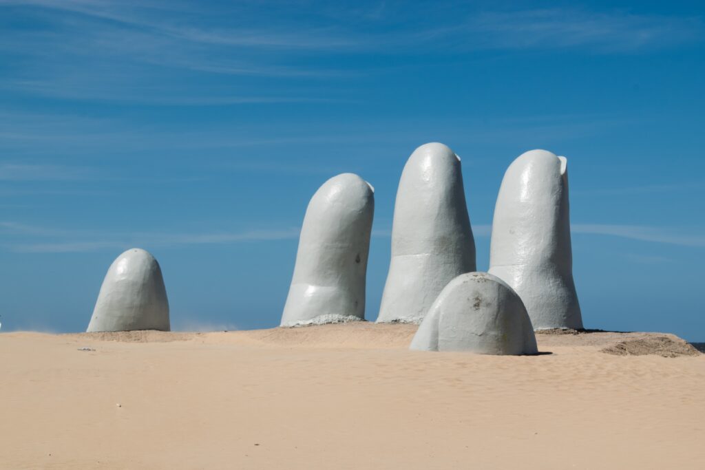 La Mano (The Hand) sculpture in Punta del Este, Uruguay (Photo Credit: Ernesto Velázquez on Unsplash)