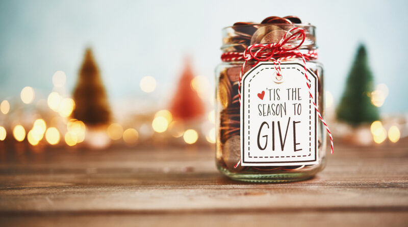 It's the season to give. Donation jar with money