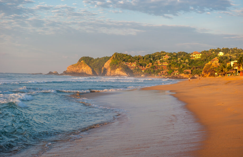 Zipolite beach at sunrise (Photo Credit: iStock)