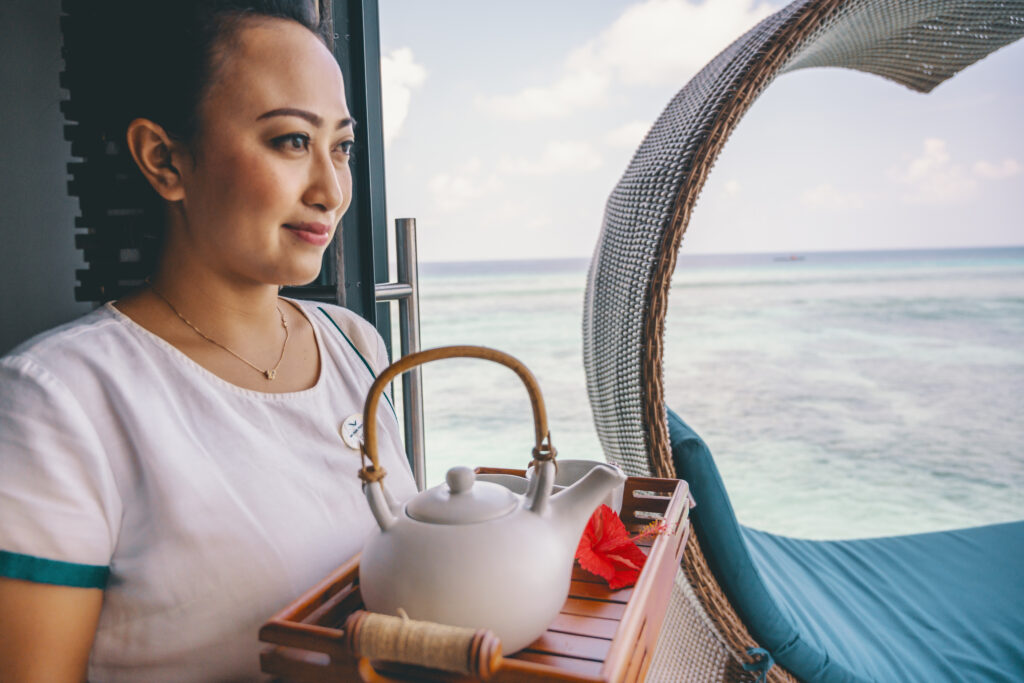 Spa attendant serves you tea or cool tamarind water before your spa treatment.