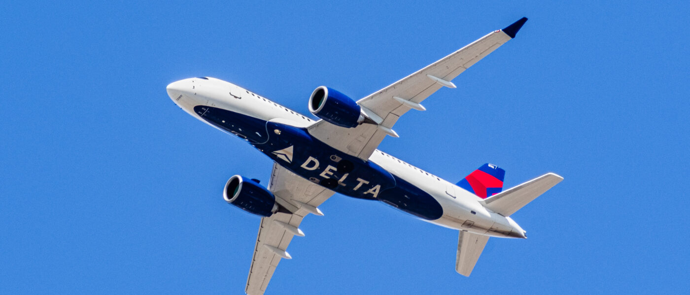 Mother frustrated when no an "X" option isn't listed as an option for nonbinary travelers on Delta Airlines Online Reservations System. (Photo Credit: Sundry Photography / iStock)