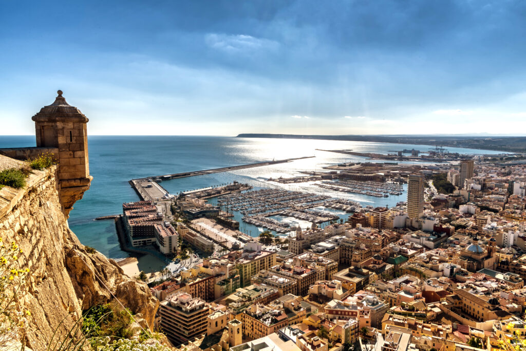 View from atop Mount Benacantil, a view of part of historic Castel Santa Barbara, Alicante marina and old city, all located on Costa Blanca in Spain. (Photo Credit: Ed-Ni-Photo / iStock)