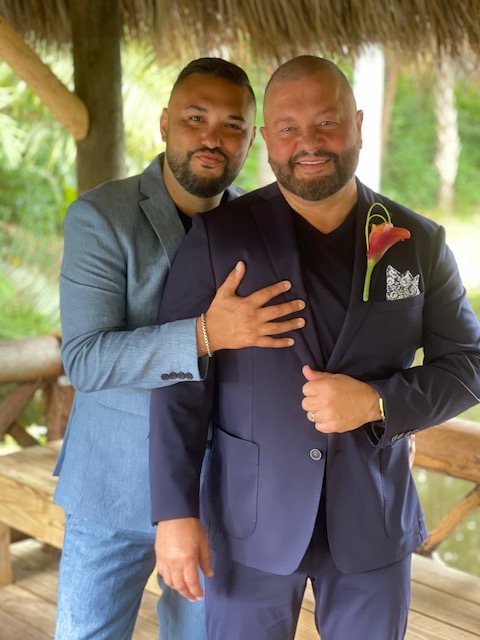 Ralph Vega (left) and Tim Ellington (right) on their wedding day at the Bonnet House Museum and Garden in Fort Lauderdale, Florida. (Photo Credit: Ralph Vega & Tim Ellington)