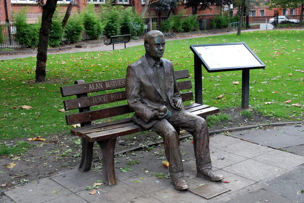 Alan Turing Statue in Manchester, England (Photo Credit: Wikimedia Commons)