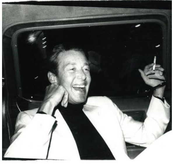 Halston in the backseat of a limo enroute to Studio 54 with Bianca Jagger (Courtesy Hedges Projects, Los Angeles. Copyright The Andy Warhol Foundation for the Visual Arts.)
