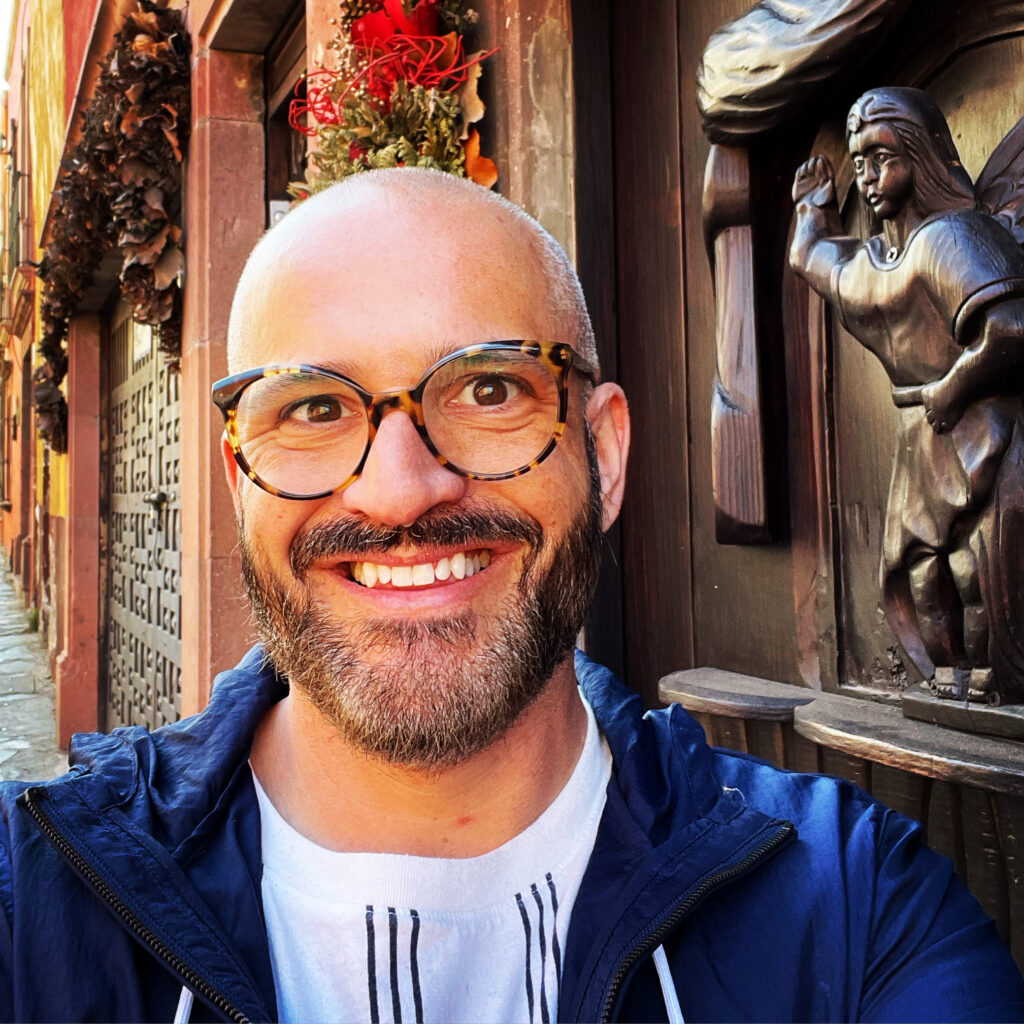 Stephen in front of one of the elaborately decorated doorways of San Miguel. (Photo Credit: Stephen Ekstrom)