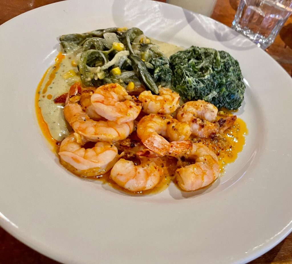 Garlic seared shrimp with poblano peppers and creamed spinach from Hecho En Mexico. (Photo Credit: Stephen Ekstrom)