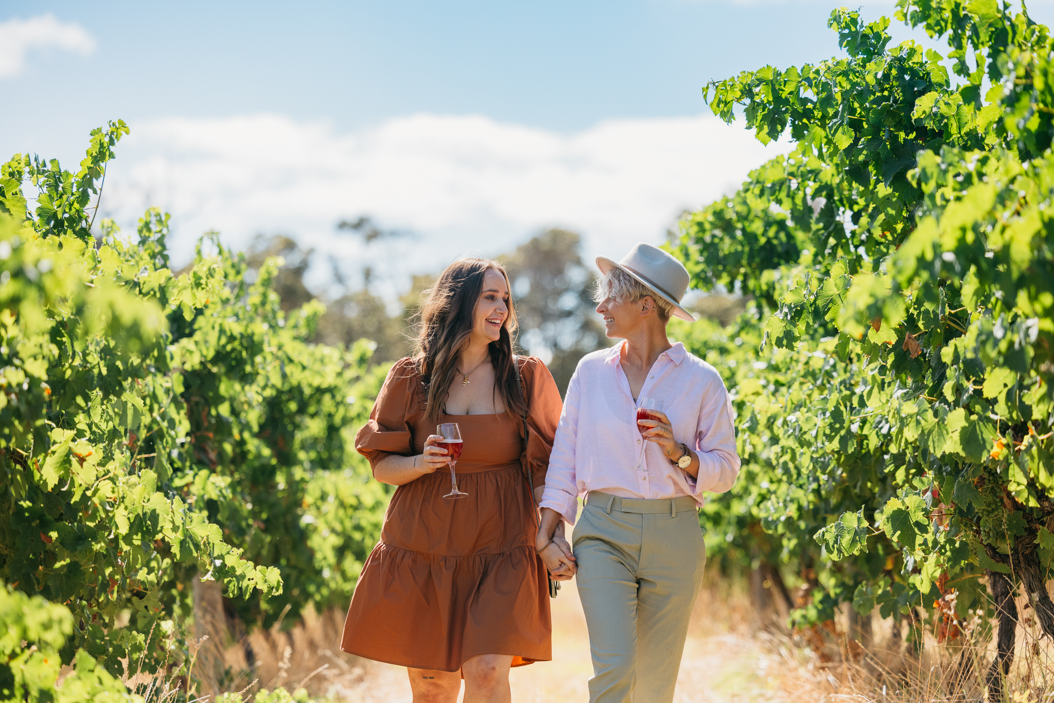 Jessie Stoelwinder and Em Williams walk through the Margaret River Wine Region. (Photo Credit: Jarrad Seng / Celebrity Cruises / AIPP)