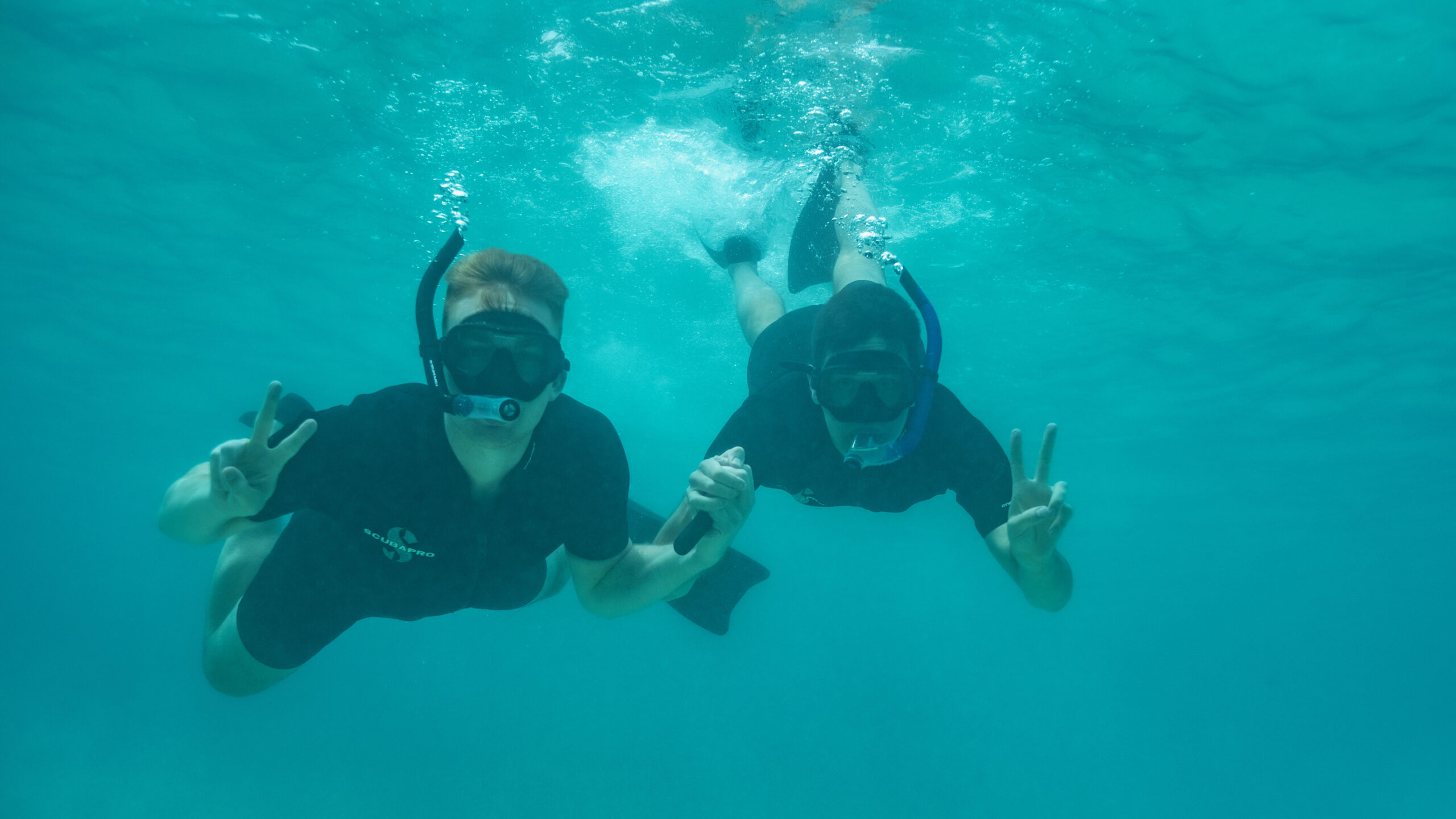 Will and James snorkeling in search of Sea Turtles (Photo Credit: David Ballesteros for Hurtigruten Expeditions)