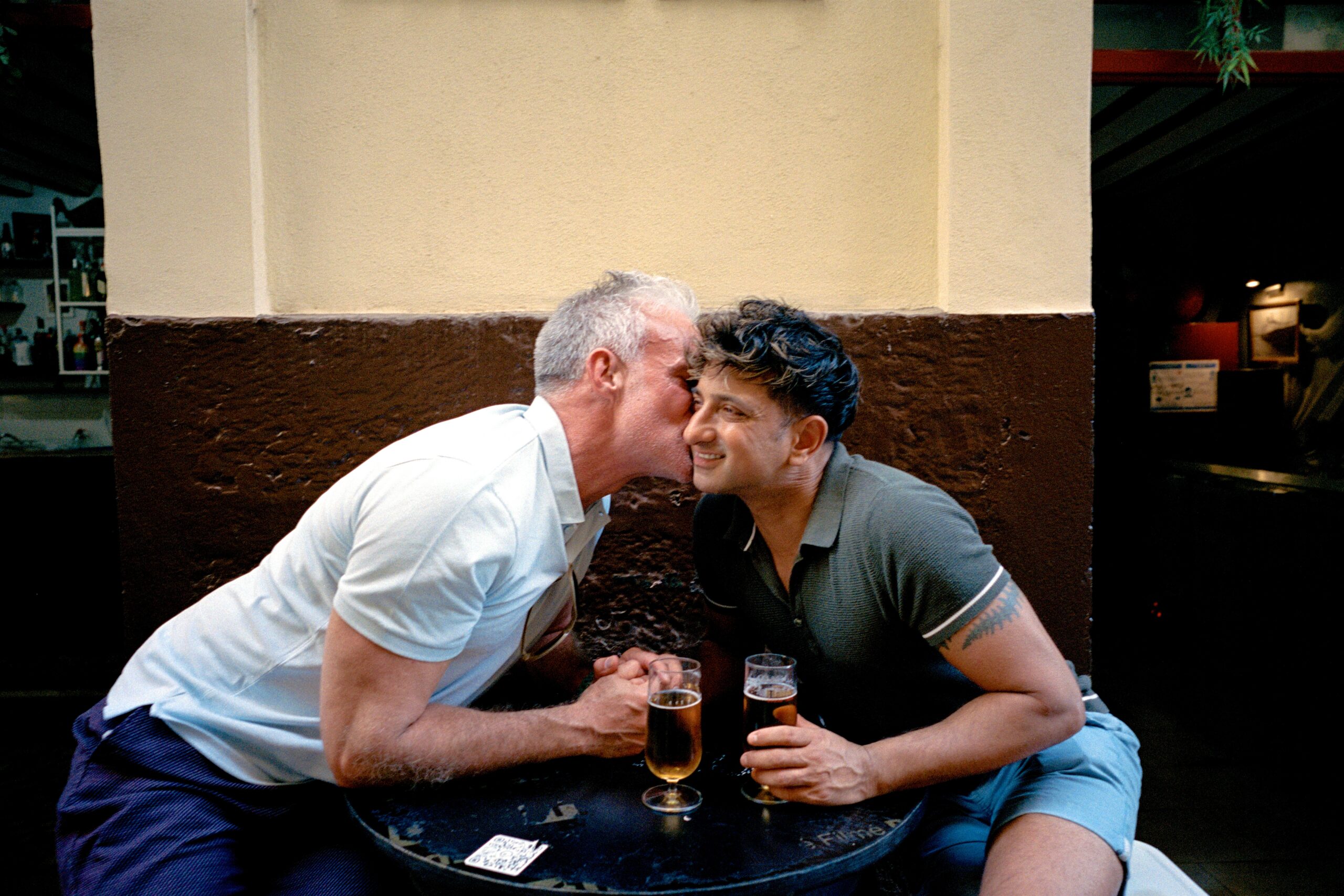 Engaged couple Tim and Sheehan share a kiss. (Photo Credit: Giles Duley / Celebrity Cruises / AIPP)