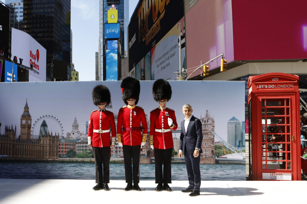 London's Mayor Sadiq Khan with the Coldstream Guards at the 'Let's Do London' U.S. Tourism Campaign Times Square Takeover in New York. (Photo Credit: Jason Decrow/AP Images for London & Partners)