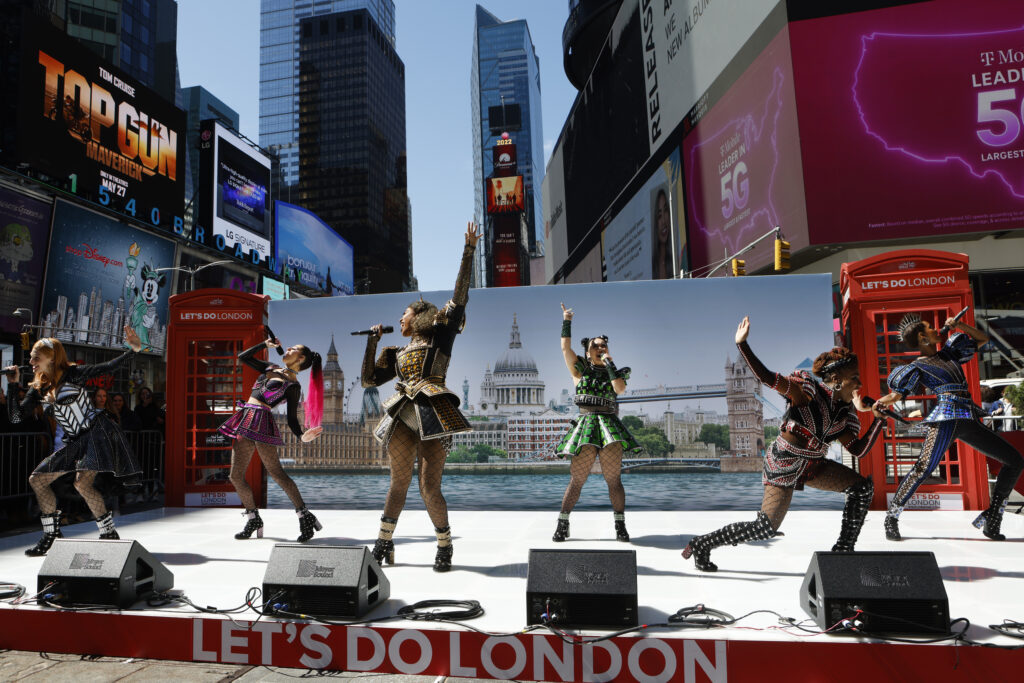 Cast of SIX perform mashup of "Six" and "Ex-Wives" at "Let’s Do London” U.S. Tourism Campaign Launch in Times Square in New York. (Photo Credit: Jason Decrow/AP Images for London & Partners)