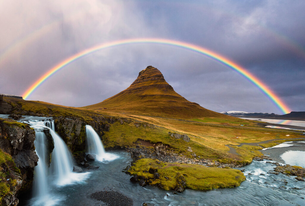 Kirkjufell Mountain and Kirkjufellsfoss Waterfalls (Photo Credit: technotr / iStock)