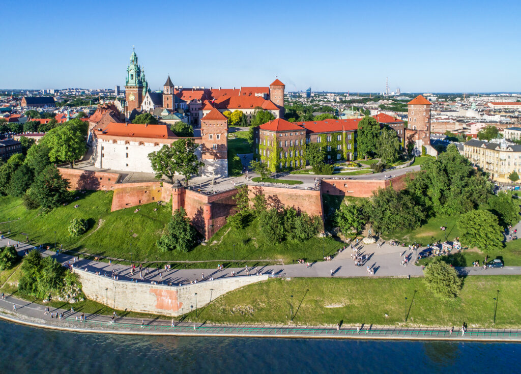Aerial view of Wawel hill with historic royal castle and cathedral, Vistula River, and the park (Photo Credit: Krzysztof Nahlik / iStock)