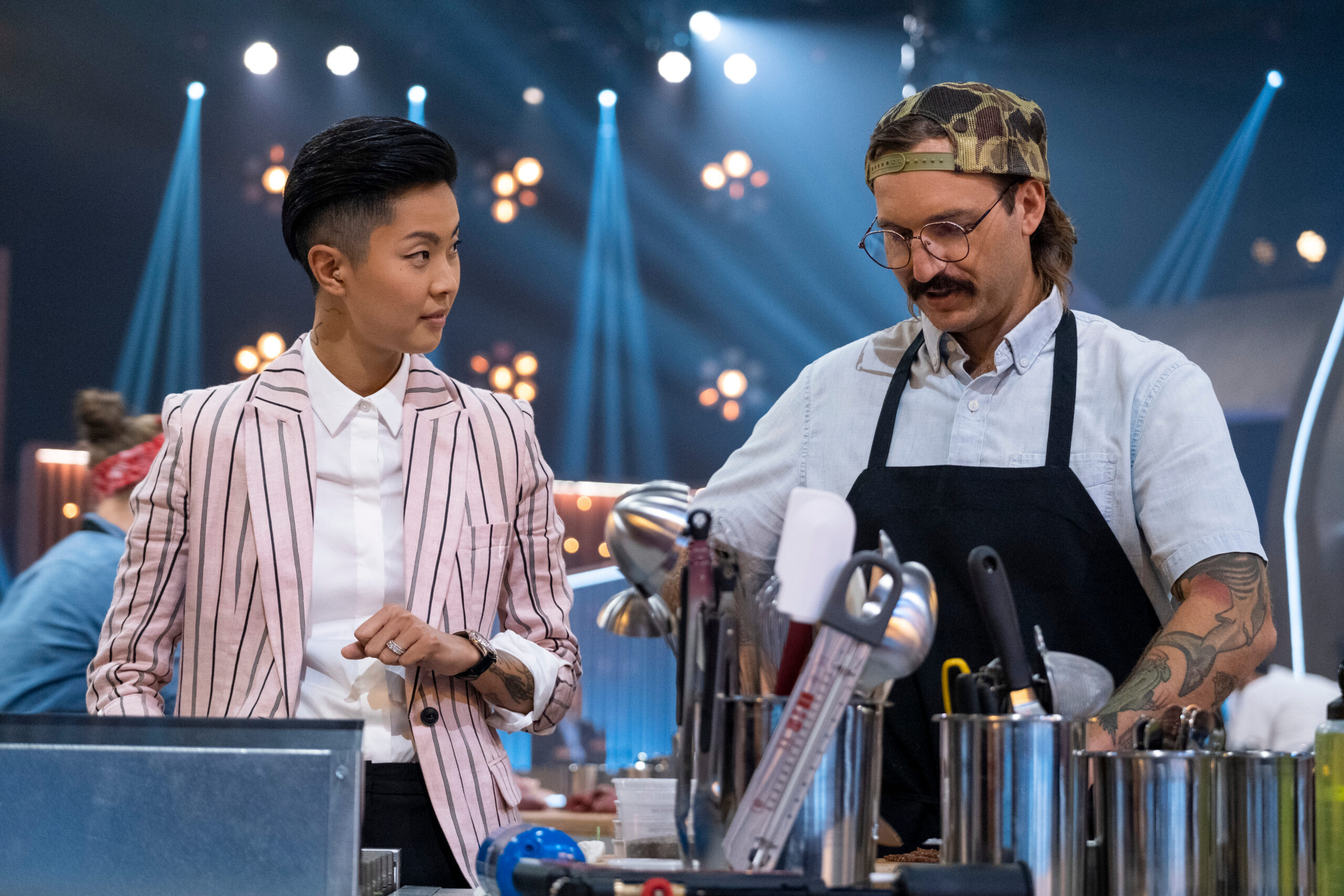 Co-host Kristen Kish and Challenger chef Mason Hereford on Iron Chef: Quest for an Iron Legend. (Photo Credit: Adam Rose/Netflix © 2022)