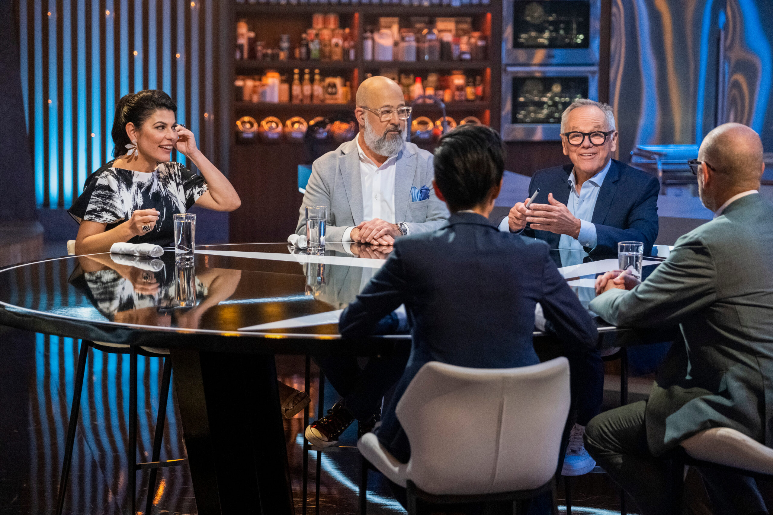 Judges and hosts from left to right, Nilou Motamed, Andrew Zimmern, Kristen Kish, Wolfgang Puck, Alton Brown (Photo Credit: Adam Rose/Netflix © 2022)