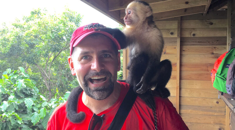 Eric Hope with a new friend on Roatán Island, Honduras (Photo Credit: Eric Hope)