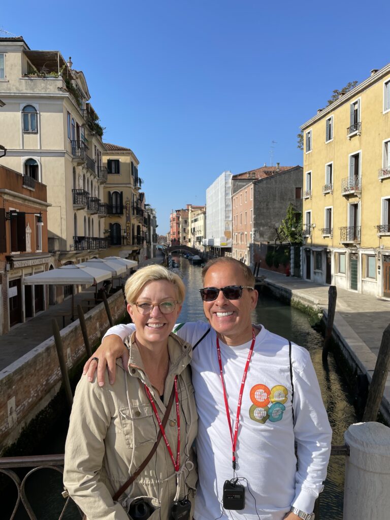 Kelli and her business partner Gregg Kaminsky in Venice, Italy (Photo Credit: Kelli Carpenter)