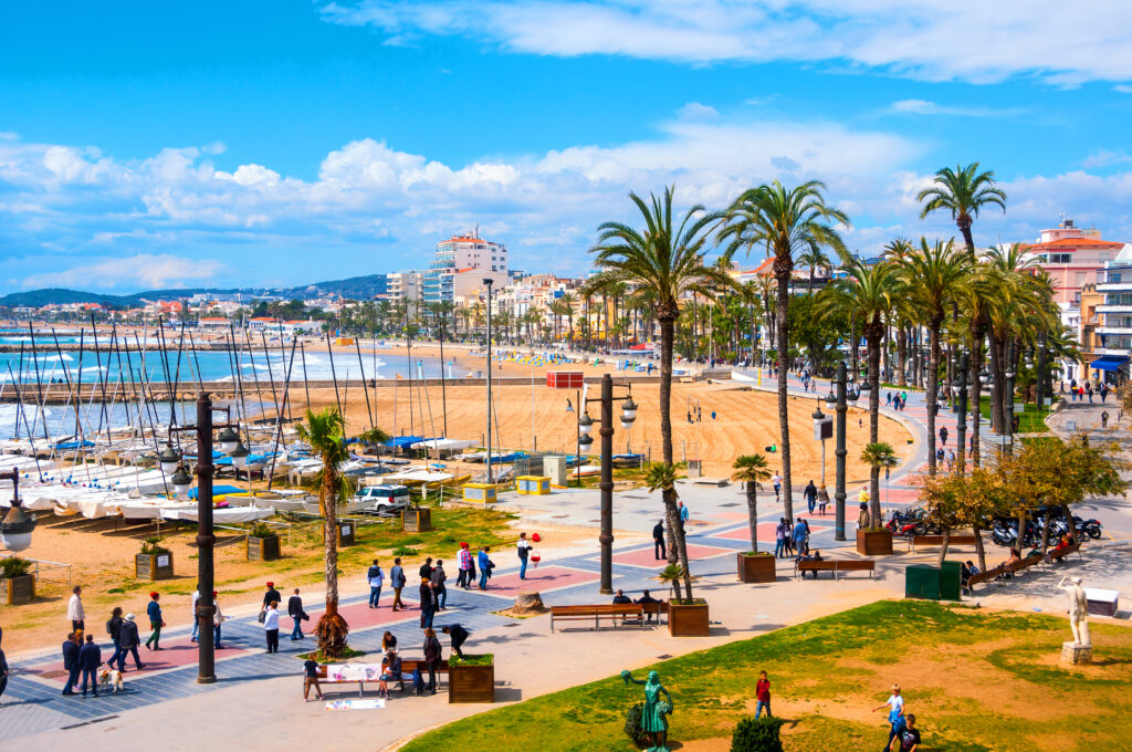Sitges Beach and Promenade (Photo Credit: MadrugadaVerde / iStock)