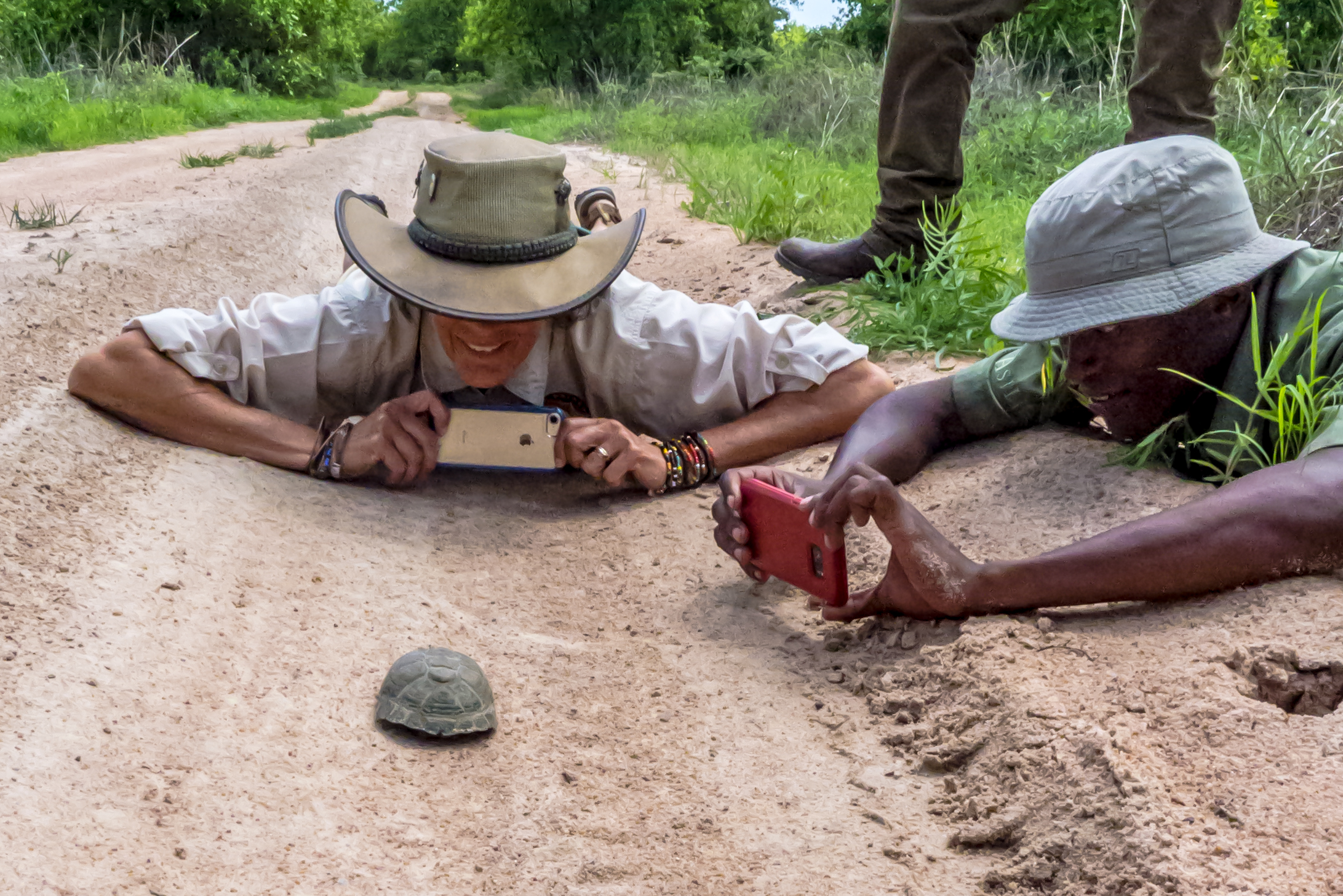 Jody, Tony and a Hinged Terrapin at Ruaha National Park in Tanzania (Photo Credit: Wild Rainbow African Safaris)