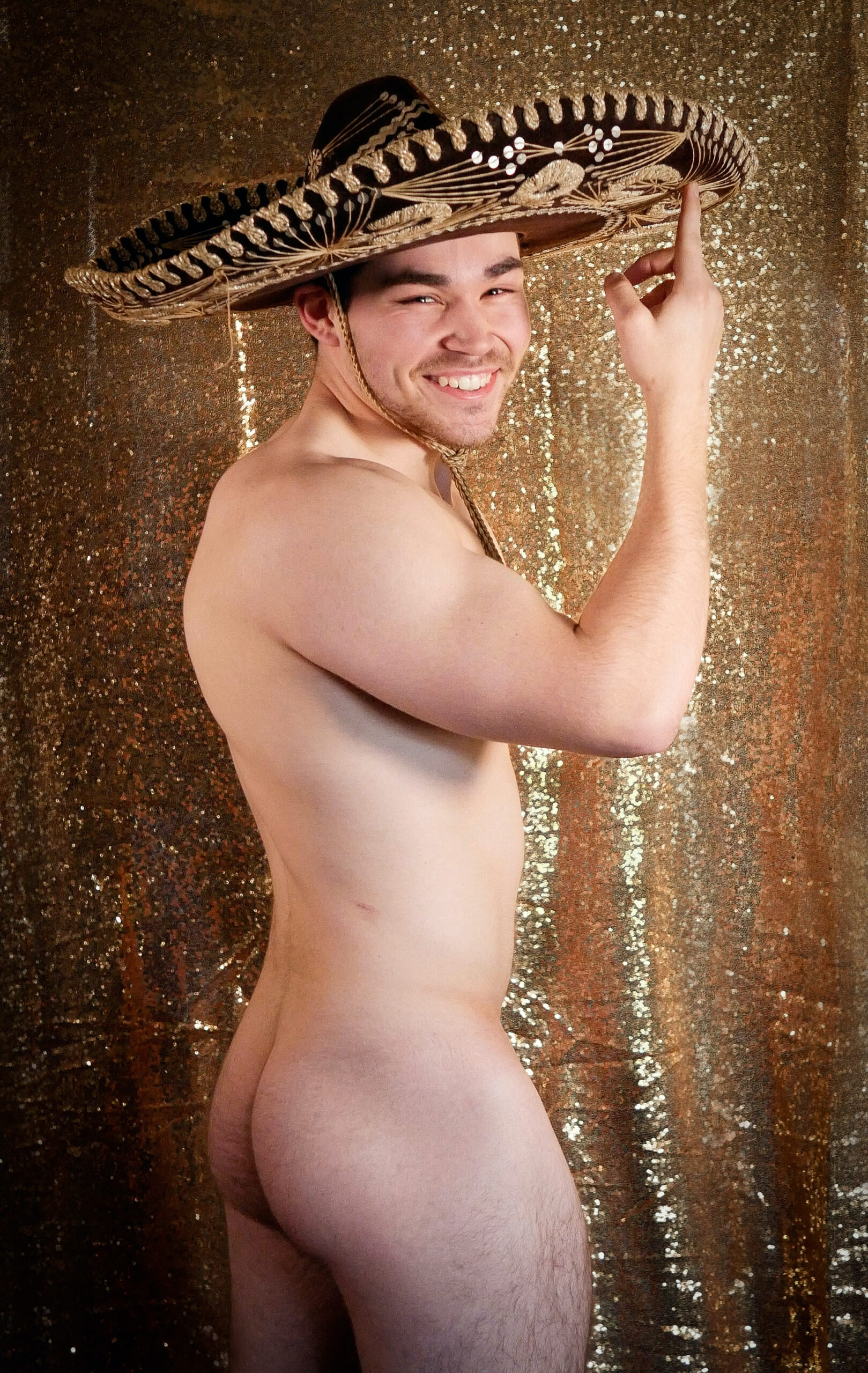 Nudist Michael wearing a sombrero (Photo Credit: GoNaked)