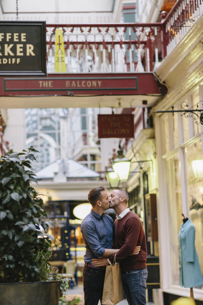 A gay couple enjoying the shopping facilities at Castle Arcade in Cardiff. (Photo Credit: Visit Britain)