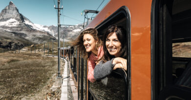 Couple on a Gornergrat Railway train in Switzerland (Photo Credit: Pink Alpine)