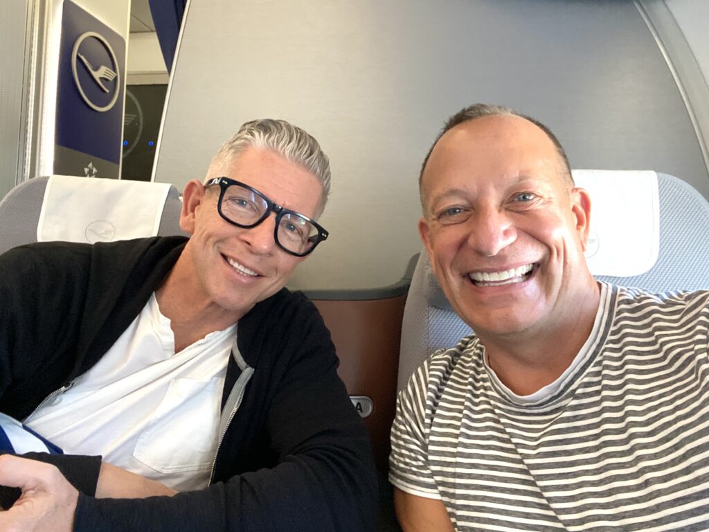 Triton and Jon on nonstop flight to Munich, Germany (Photo Credit: 2 Dads with Baggage)