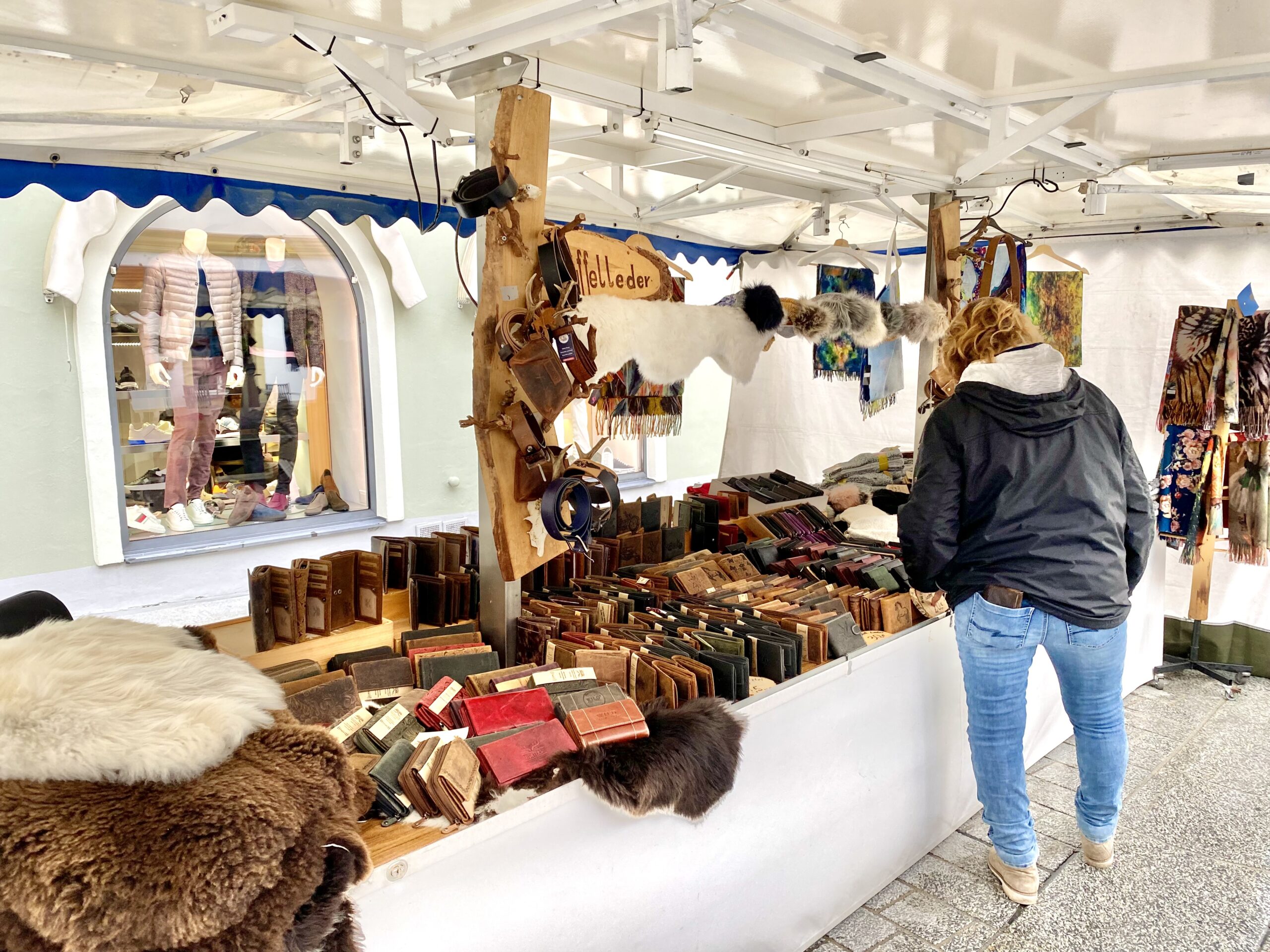 Shopping at a street market in Kitzbuhel (Photo Credit: 2 Dads with Baggage)