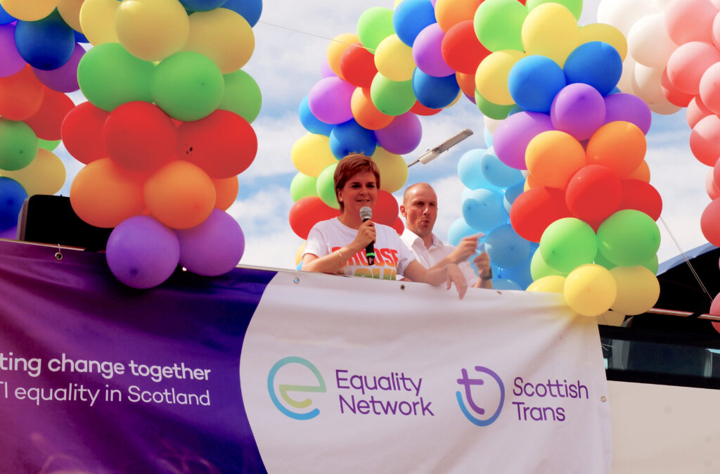 First Minister Nicola Sturgeon addresses crowd from bus as Grand Marshall of Pride Glasgow on July 15th 2018. (Photo Credit: Oliver Wain / Shutterstock)