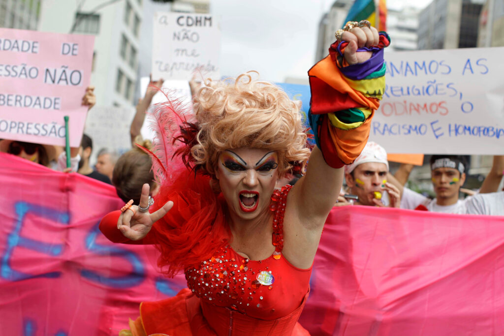 A drag queen shout slogans during a demonstration against the high rates of hate crime, violence and homophobia towards gay and transgender people.(Photo Credit: Nelson Antoine / Shutterstock)