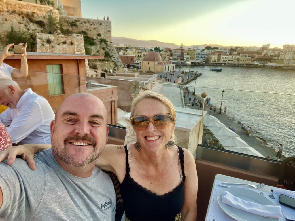Jason with Andrea Powis, owner of Travelling Diva, in Chania, Crete, Greece (Photo Credit: Jason Smith / GuysAdventures)