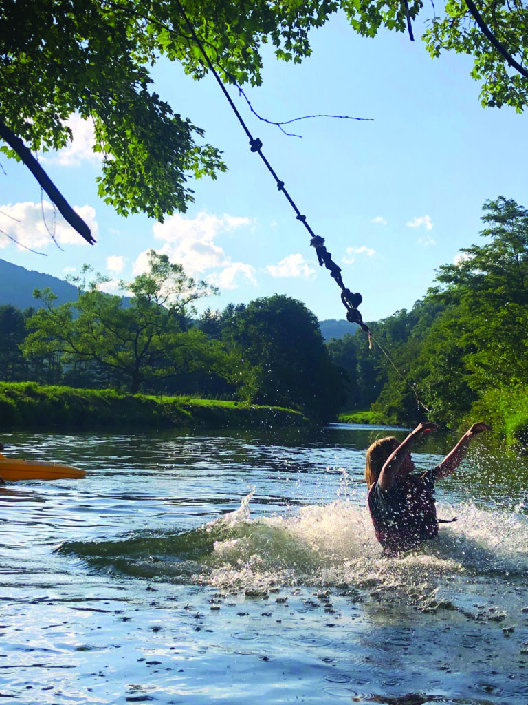 Swing jump off on New River (Photo courtesy of RiverGirl Fishing Company)