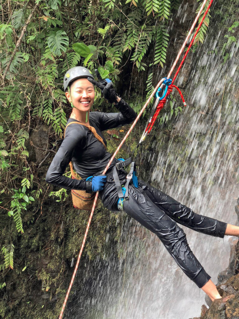 Chef Kristen Kish rappels down a waterfall to collect a type of fresh watercress which only grows in that particular location in Hacienda Mamecillo, Panama. (Photo Credit: National Geographic for Disney/Missy Bania)