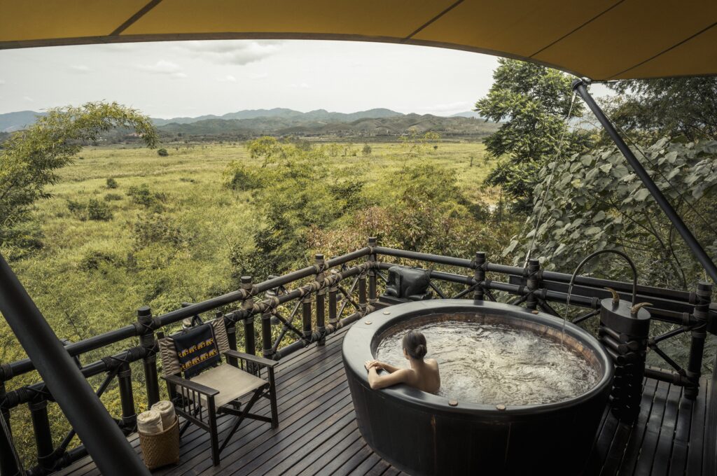 Deluxe Tent Terrace Jacuzzi at Four Seasons Tented Camp Golden Triangle (Photo Credit: Ken Seet / Four Seasons)