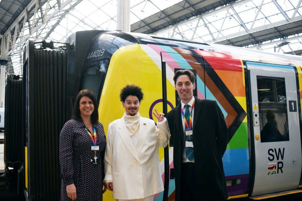 (l-r) Claire Mann, SWR Managing Director, Valentino Vecchietti, creator of the Intersex-Inclusive flag, and Stuart Meek, SWR's Chief Operating Officer (Photo Credit: South Western Railway)