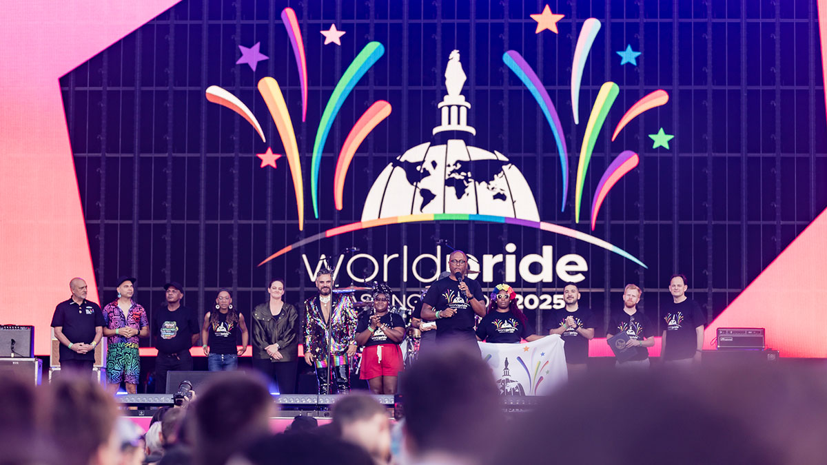Capital Pride Alliance's Ashley Smith accepts handover to Washington DC as host city for WorldPride 2025. (Photo Credit: Cain Cooper)