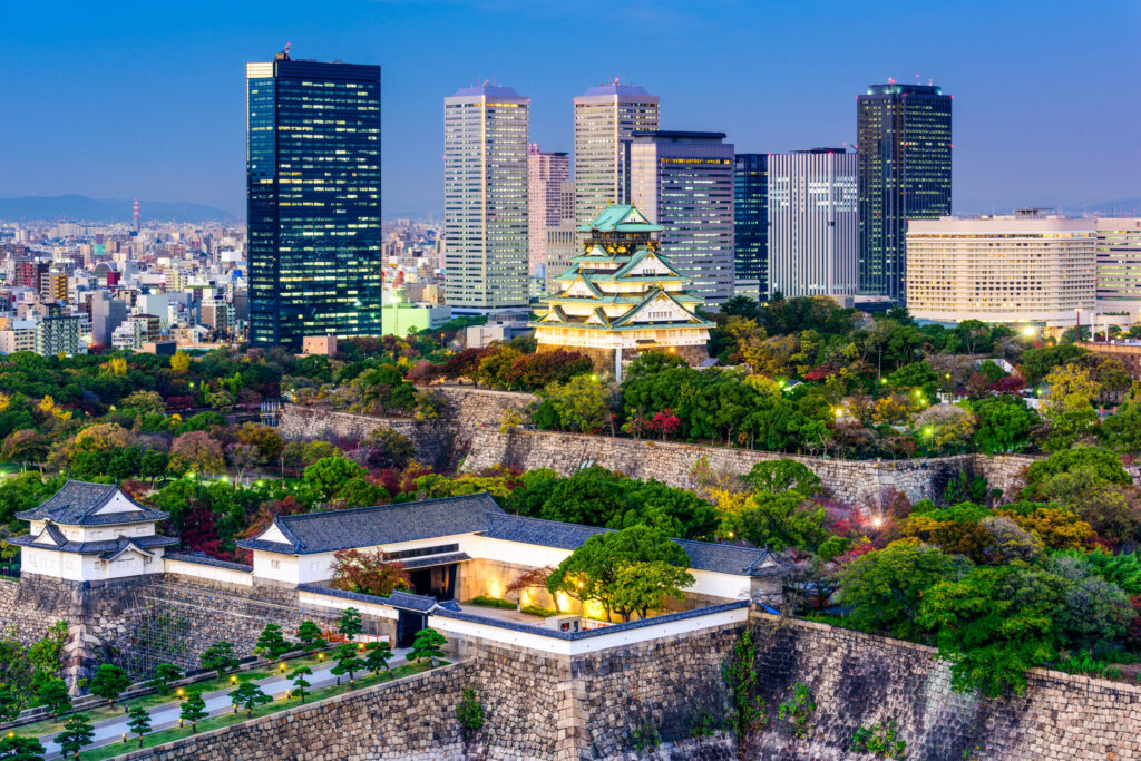 Osaka, Japan skyline at Osaka Castle Park (Photo Credit: Sean Pavone / Shutterstock)