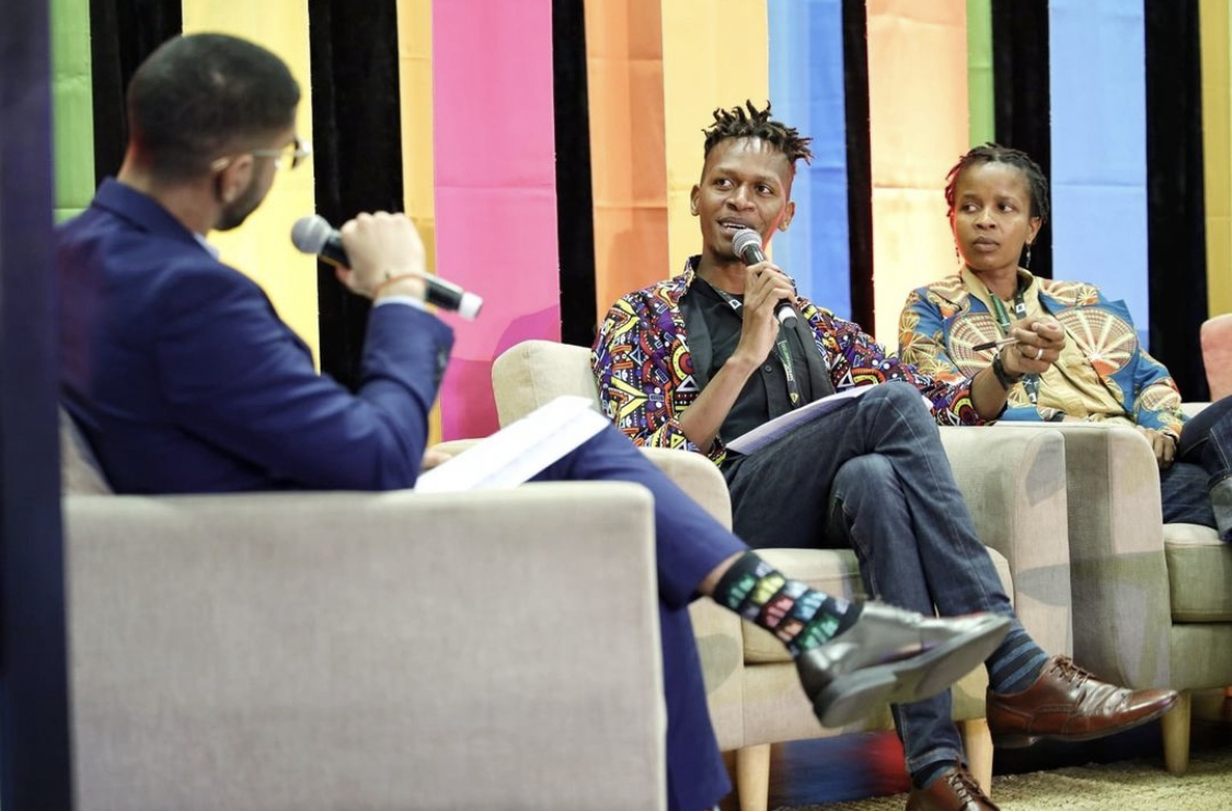 Amine Gabbouj, IGLTA Foundation Coordinator moderating the panel "Where Do We Go from Here? Expanding LGBTQ+ Tourism in Africa" with EQUAL Africa Fellowship recipient Rodney Otieno and social entrepreneur Mandima Qunta, Moonlight Experiences & The Fam. (Photo Credit: WTM Africa)