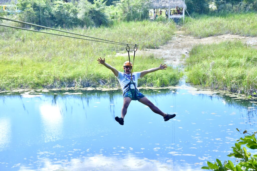 Jon ziplining over a cenote near Coba. (Photo Credit: Jon Bailey)