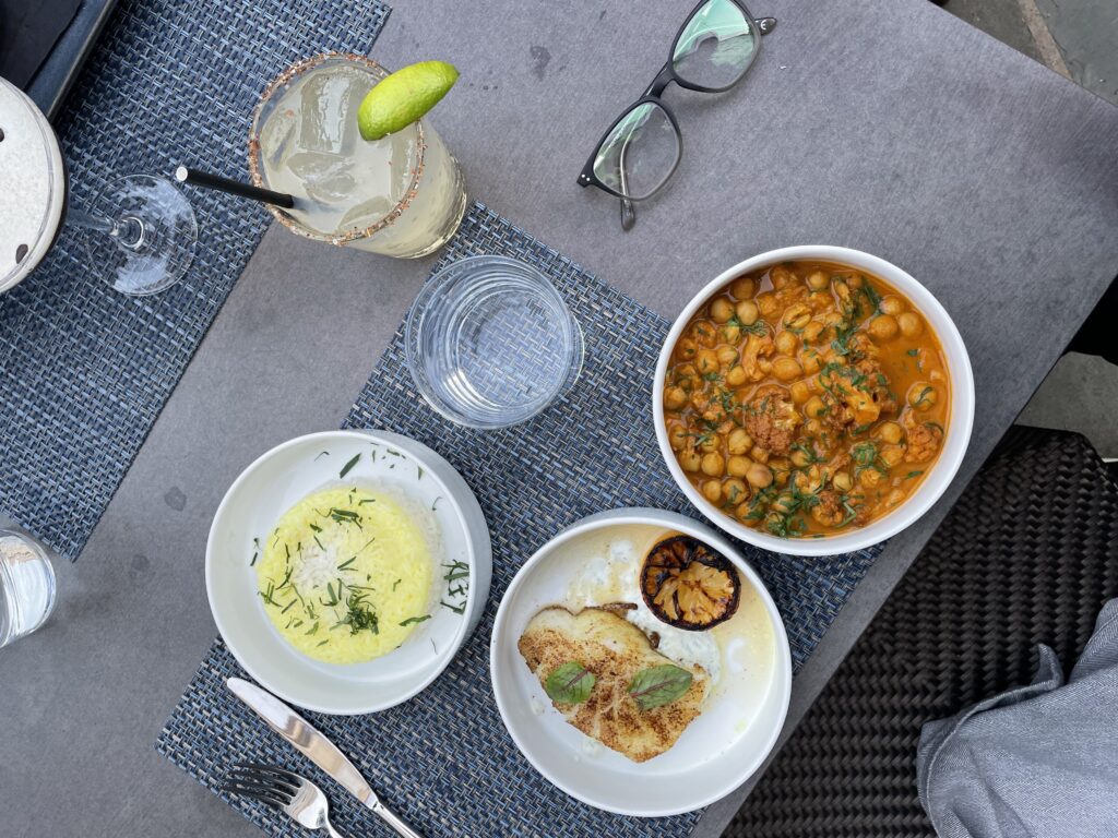 Tandoori marinated sea bass with jasmine rice, curry chickpeas and a Oaxaca-Rita. (Photo Credit: Kwin Mosby)