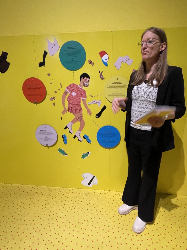 Our Trans tour guide takes us through the special "Queer" exhibit. (Photo Credit: Kwin Mosby)