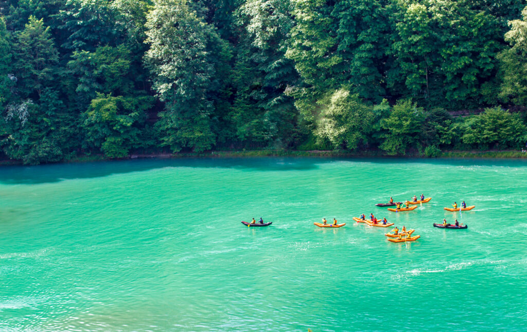 Kayaking in the Aare River in Bern (Photo Credit: PPVector / Shutterstock)